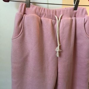 Sherpa-lined pink sweatpants